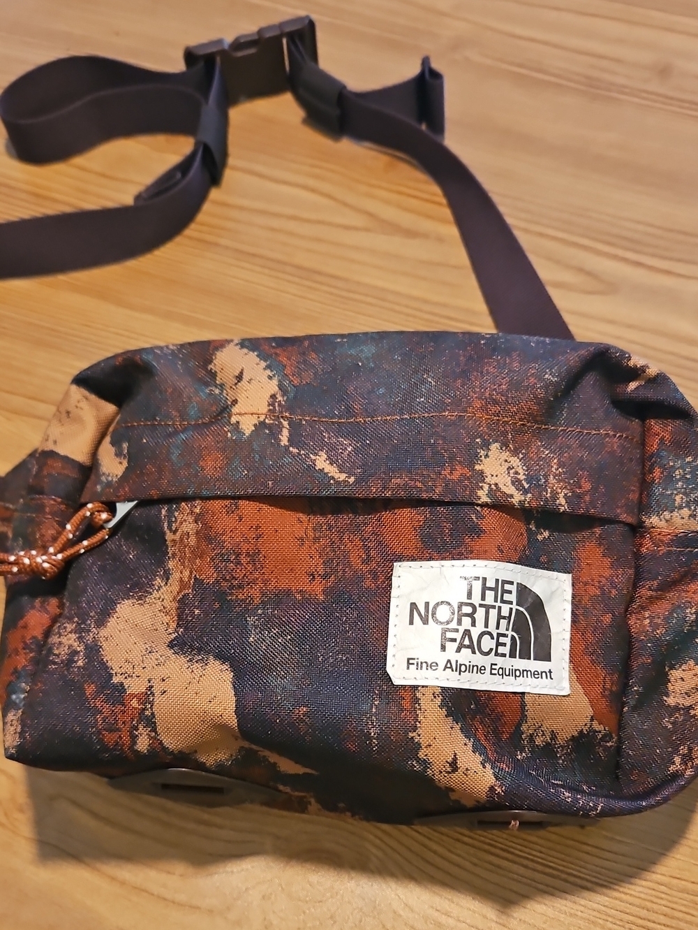 The North Face Rust Camo Belt Bag with Black Strap
